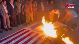 Iraqis burned American and Israeli flags in solidarity with the Palestinian people. With the current