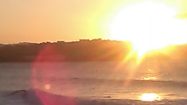 surf at sunset