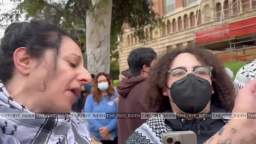 A white Palestinian activist at the University of California speaks to another white woman