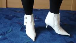 Jana shows her spike high heel booties shiny white