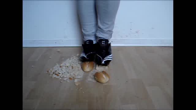 Jana crush bread rolls with her Adidas F10 soccer shoes trailer