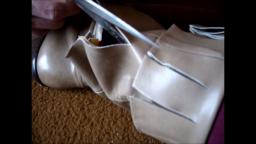 Janas friend cuts her light brown heel leather boots from their feet trailer