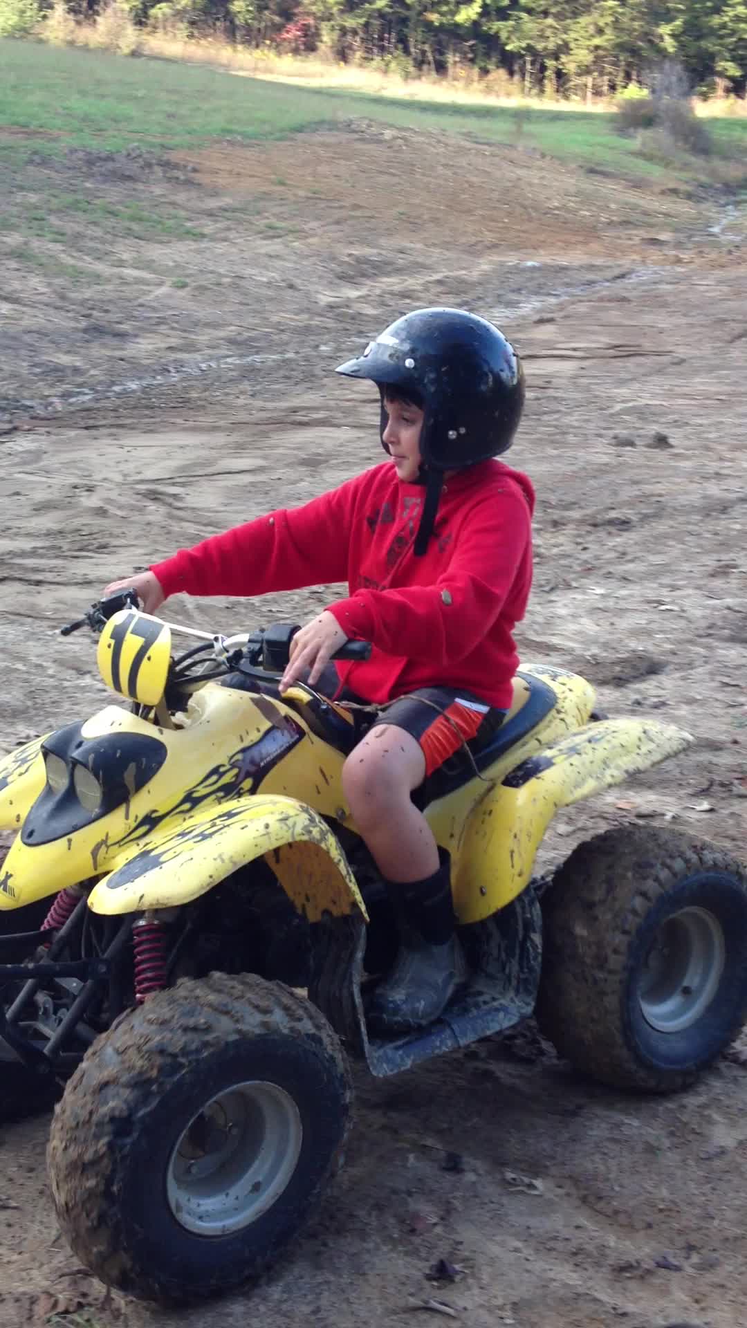 Grandson getting stuck in mud