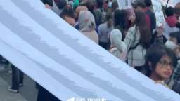At a rally in Washington, protesters unfurled a huge banner with the names of the thousands of civil